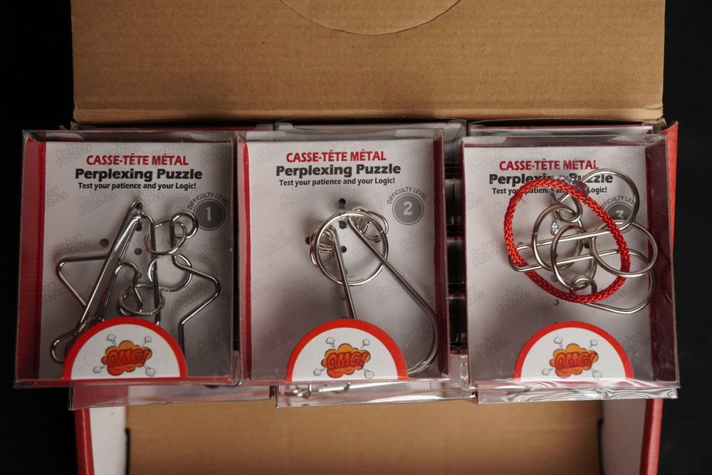 Головоломки металлические