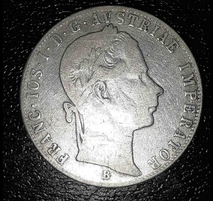 Monedă argint 1 forint 1864-B  Franc Joshep I, Kremnica 
---

*Titlu:*  
Monedă argint 1 Forint 1864 B - Franz Joseph I, Kremnica

*Descriere:*  
Vând