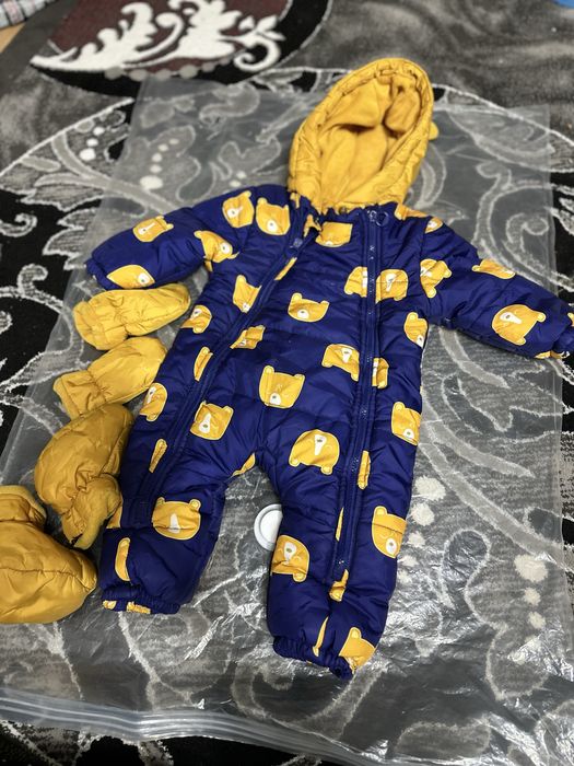 Детские комбинезоны