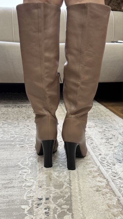 Продам новые сапоги