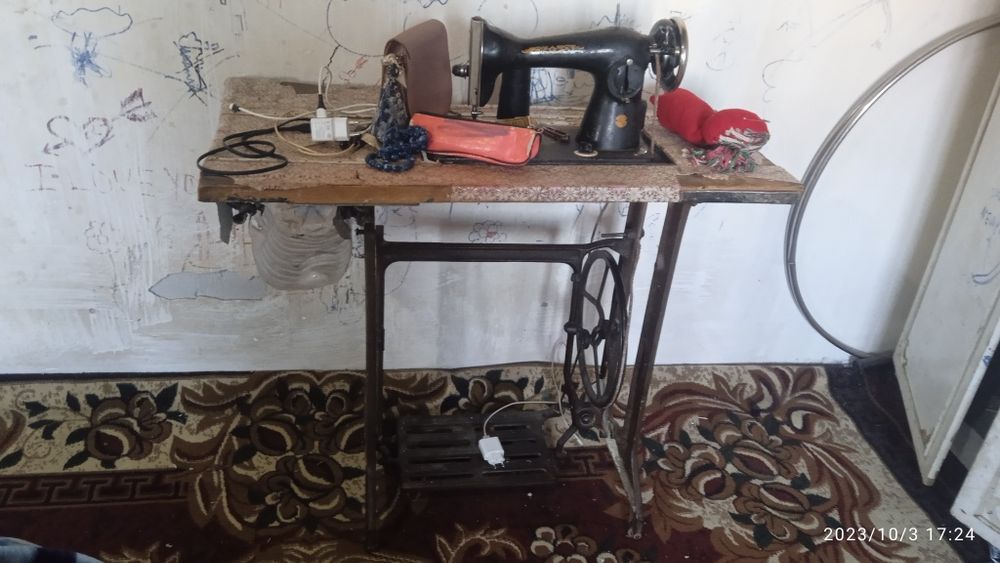 Тигиу машинасы. Швейная машина.