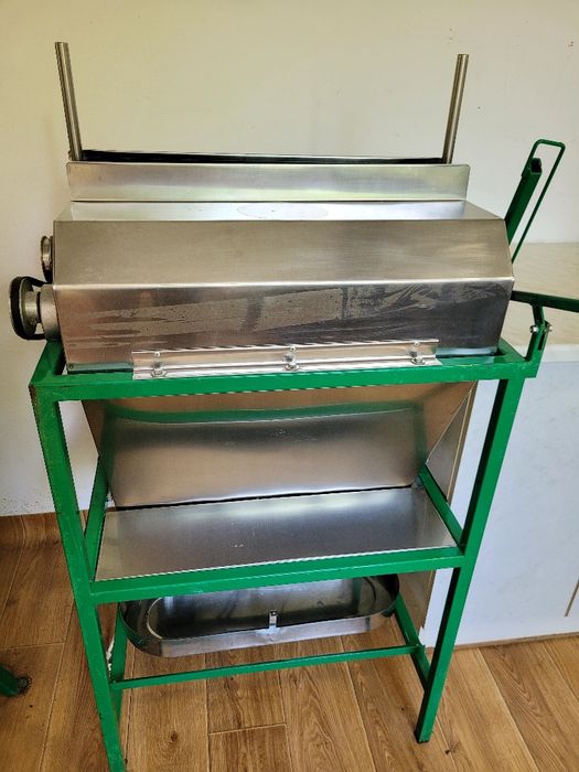 Descăpăcitor cu lamă orizontală