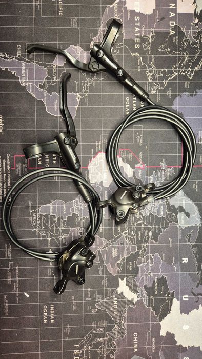 Frâne hidraulice Shimano MT200 față + spate – plăcuțe noi