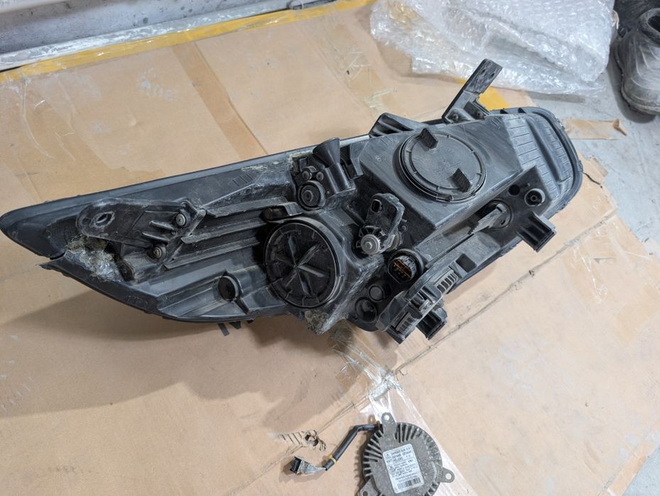 Фара левая Киа Каренс