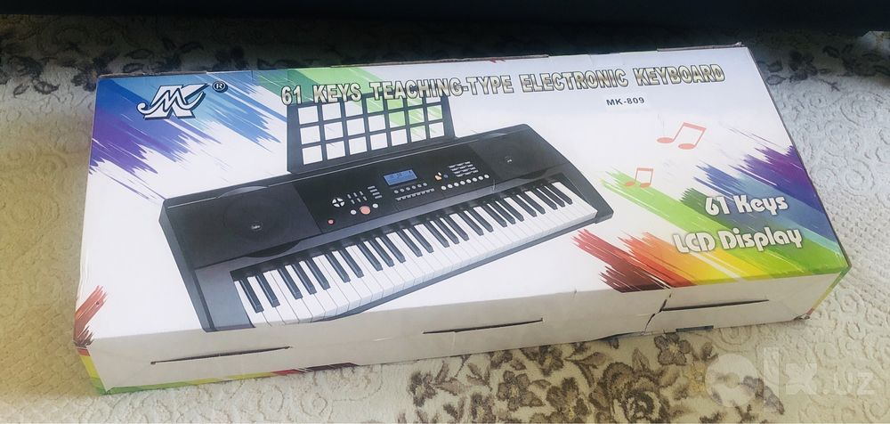 Синтезатор МК- 809 новый