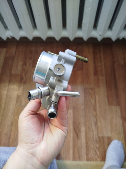 Дроссельная заслонка