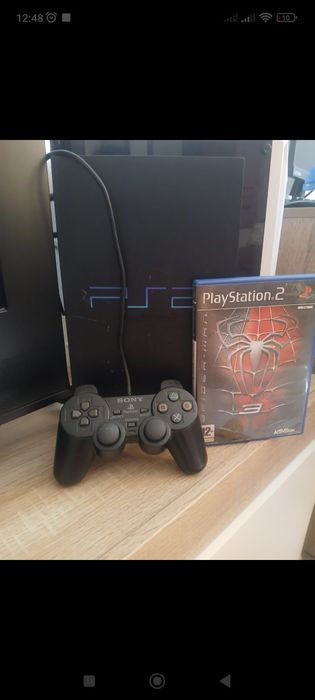 Vând PlayStation 2