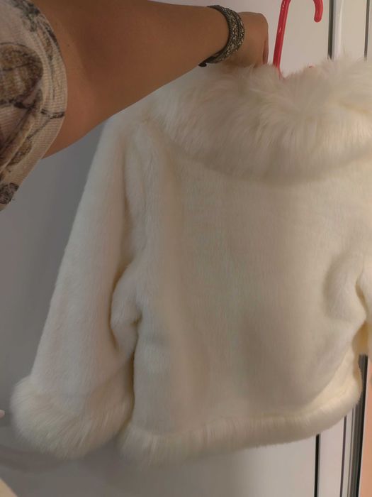 Пухено палто за зимните месеци.