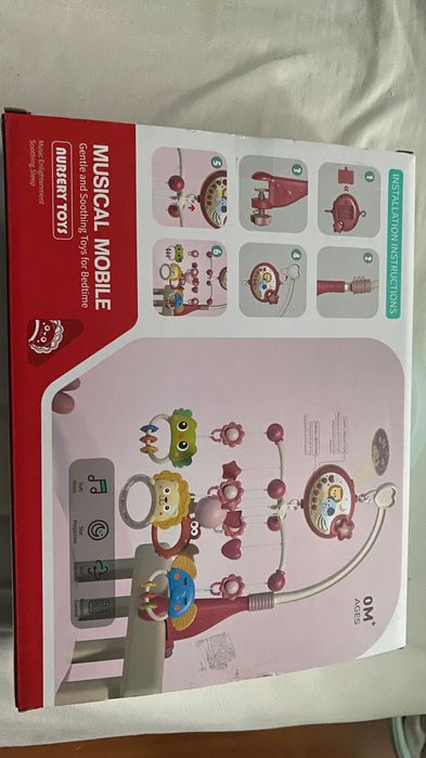 музикална въртележка за бебешка кошара с прожектор, играчки и музика.