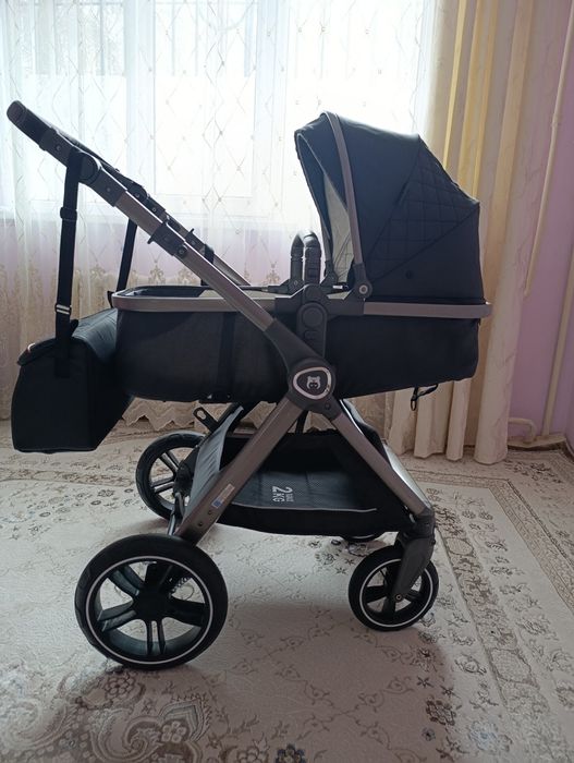 Детская коляска с сумкой