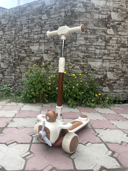 Детский самокат .