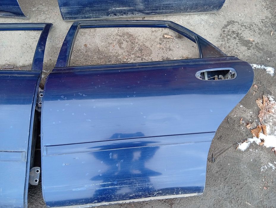 Двери Mazda Cronos Хэтчбек