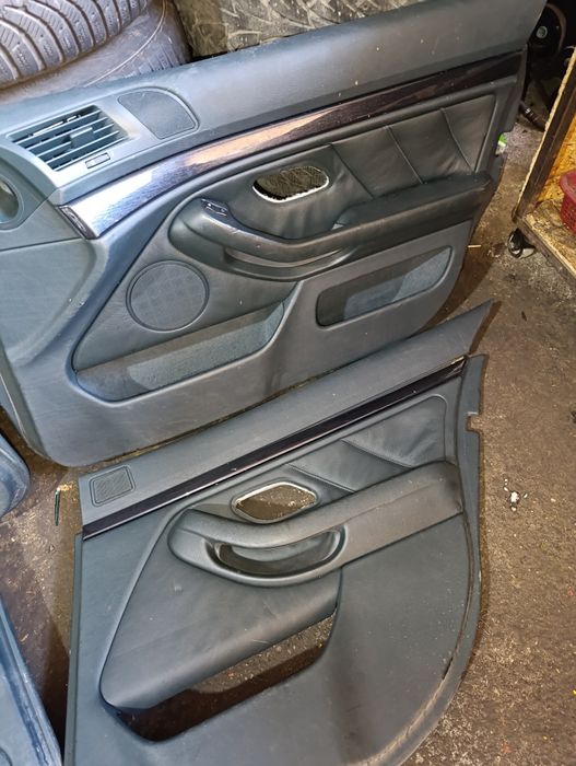 Обшивки дверей на BMW E39 кожа