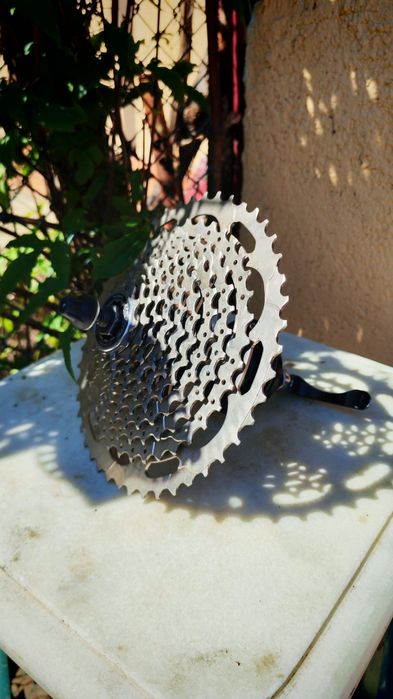Casetă Shimano Deore 10-46T + butuc spate