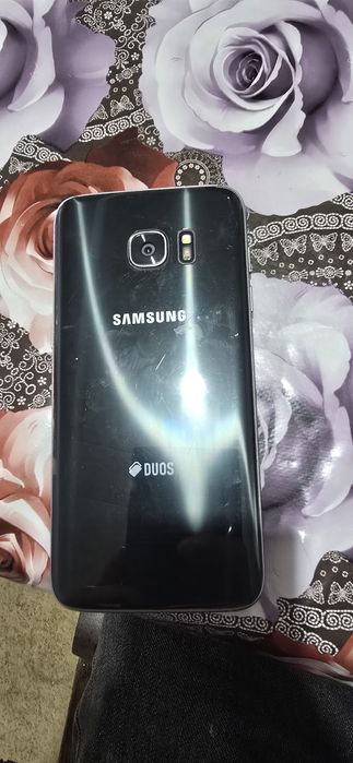 Samsung s7 eyde aybi ozgina burchagida singan qogan joyi ishlaydi