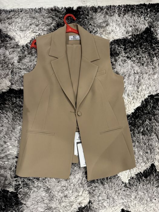 Костюм новый 42