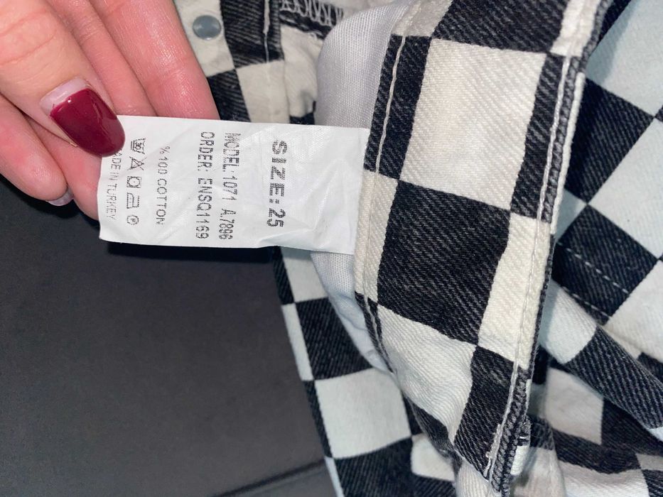 Клетчатые джинсы клеш