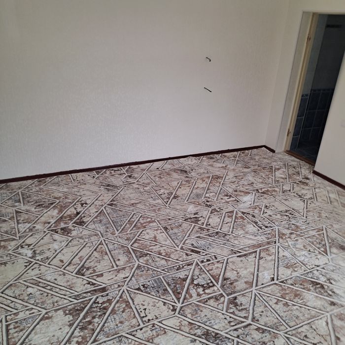 Gilam kesish va tikish