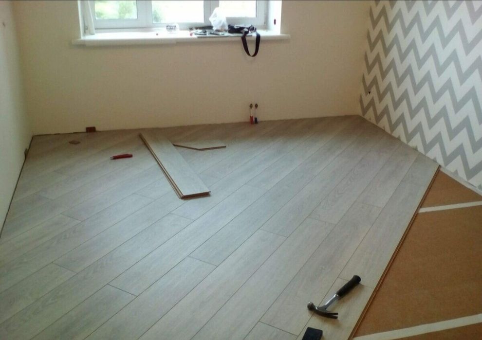 Укладка ламината, выравнивание полов.