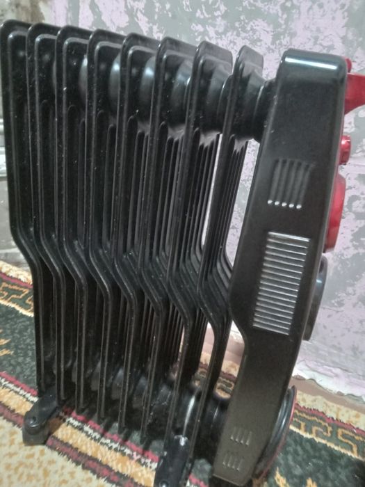 Продам обогреватель масляный