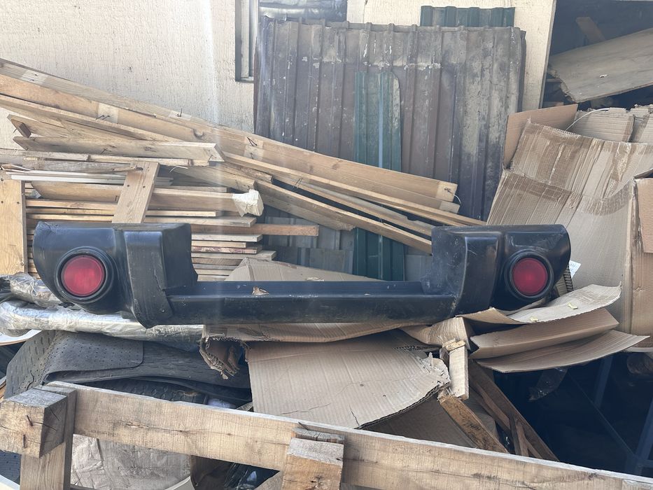 Задний бампер L200