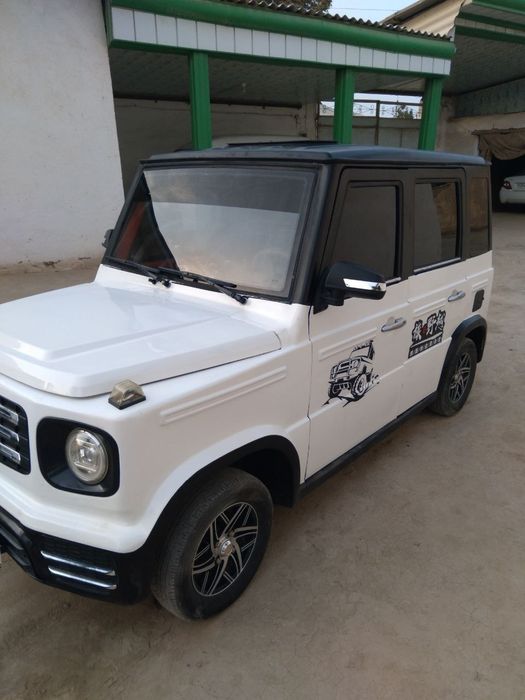 Elektramobil mini gelik 90 km yurip duripdi 4  omozotir damanik qoyilg