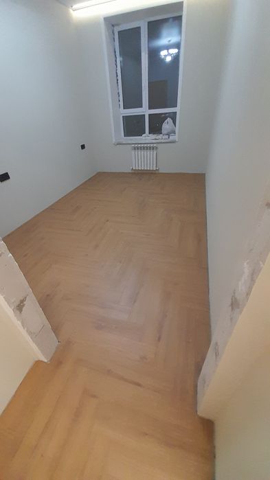 Укладка ламината  Ламинат төсеу