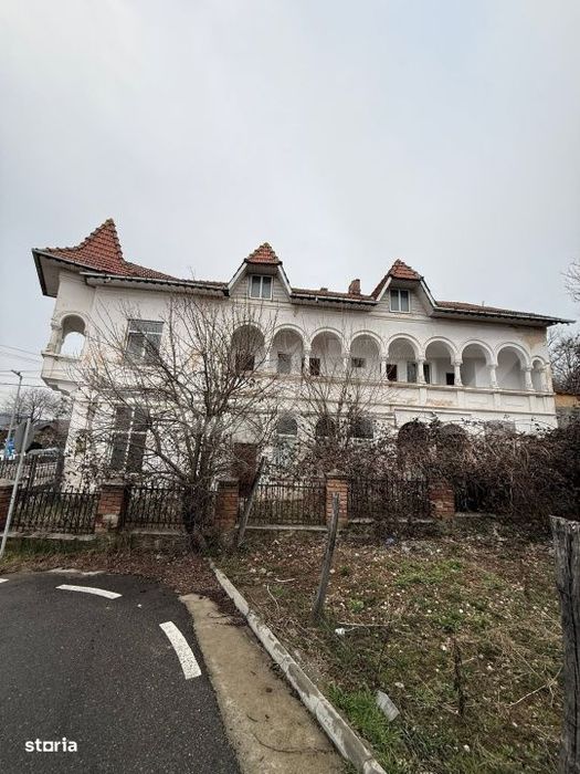 Cladire P+1 cu 9 camere si Terasa Spectaculoasa, Ideala pentru Pensiun