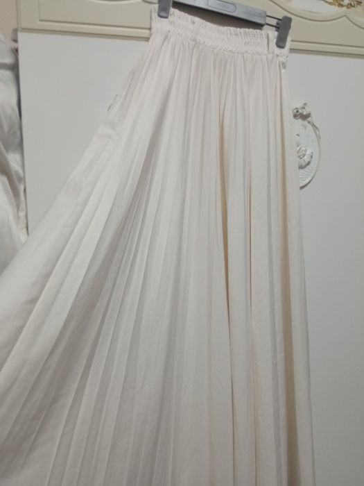 Юбки разные солнце клёш и плесированые а также юбка брюк