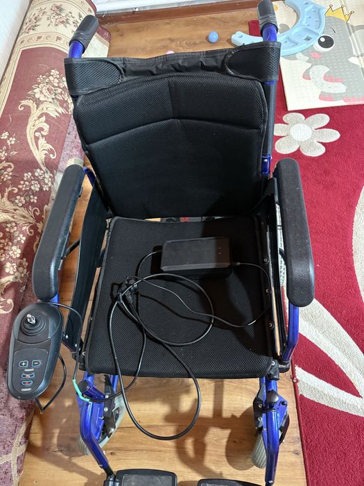 Электрическая инвалидкая коляска