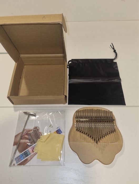 Калимба в виде лапки