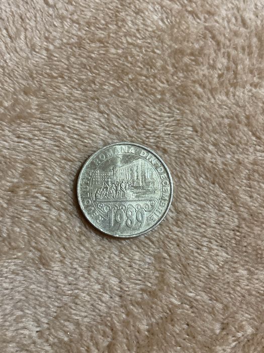 Vând moneda de la revolutie 1989