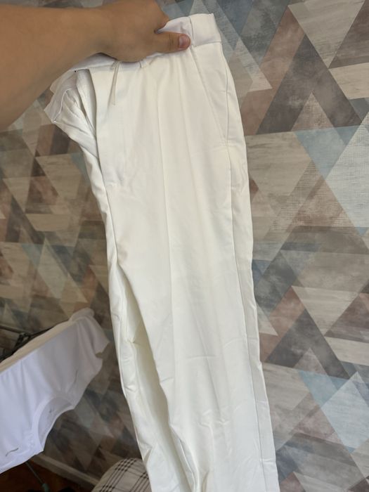 Продам белые штаны новые