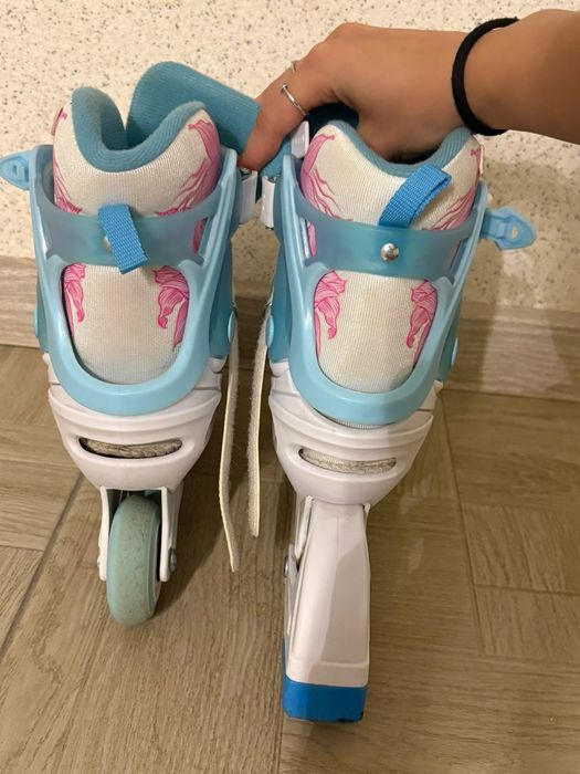 Роликовые коньки