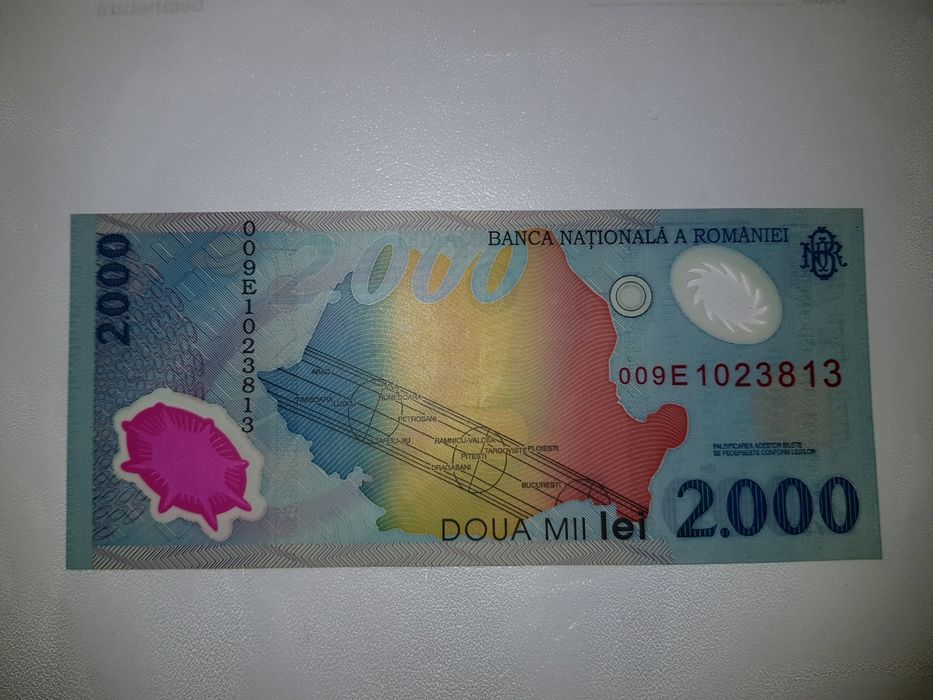 Bancnota 2000 lei eclipsa de soare și moneda 500 lei