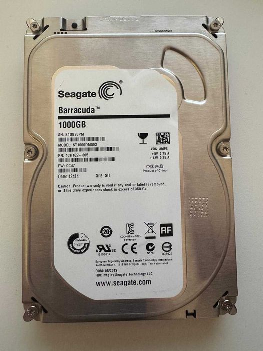 Seagate Barracuda 1TB, model ST1000DM003, pentru PC desktop, DVR/NVR sau stocare generală.