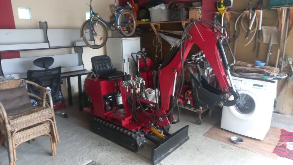 Vând  miniexcavator