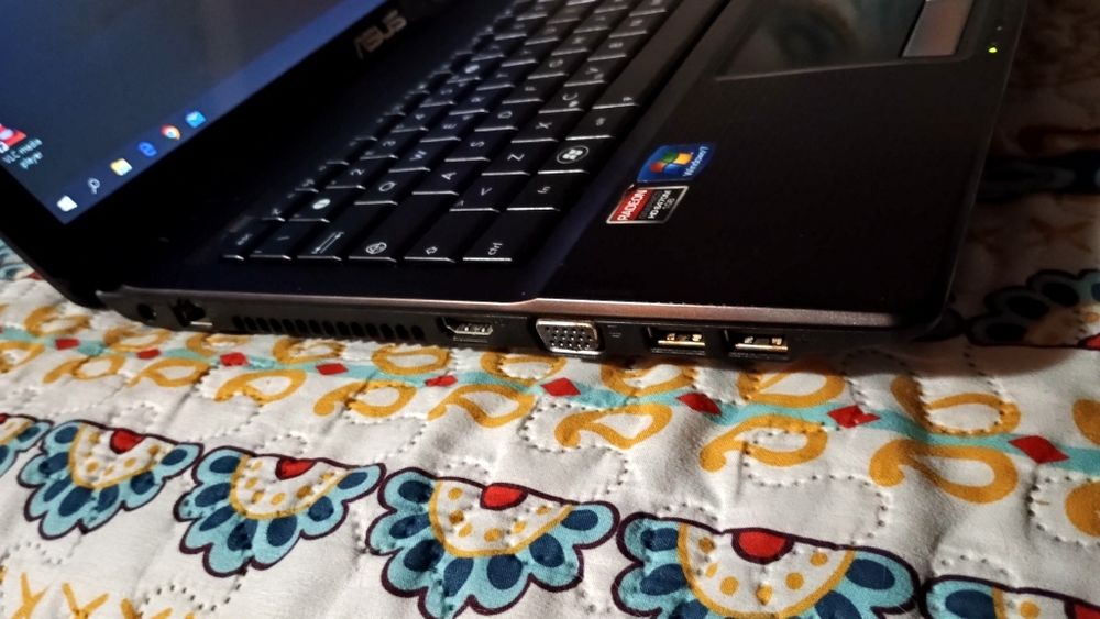 Laptop scoala office media jocuri Asus X53 AMD 3ghz 4gb ram hdd 320gb baterie 3 ore stare buna