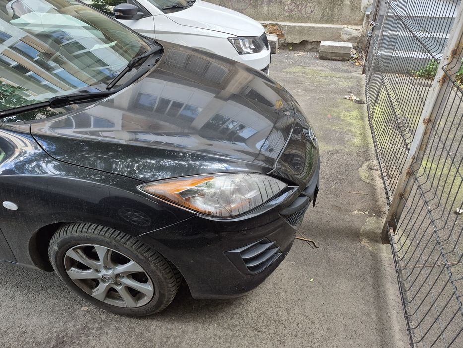 Faruri mazda 3 an 2009