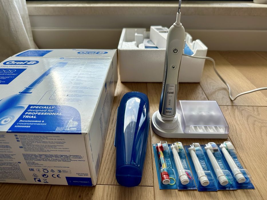 Periuta de dinti electrica Oral-B Braun Triumph 5000 + 5 rezerve capete