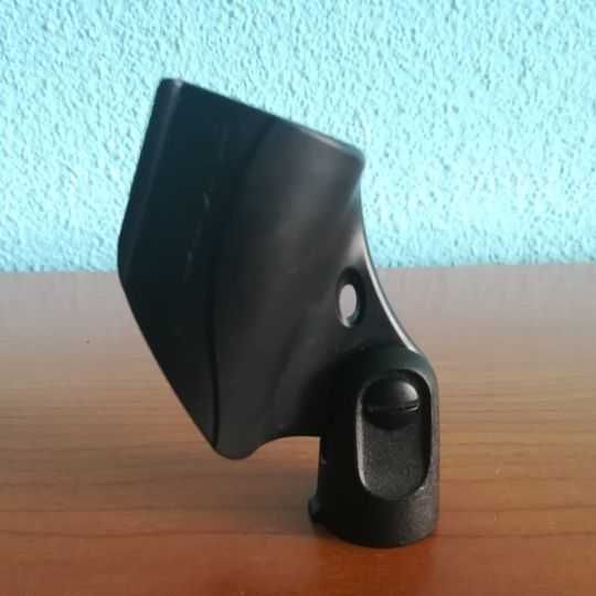 Suport nuca clema SHURE pentru microfon , realizat din ABS rezistent.