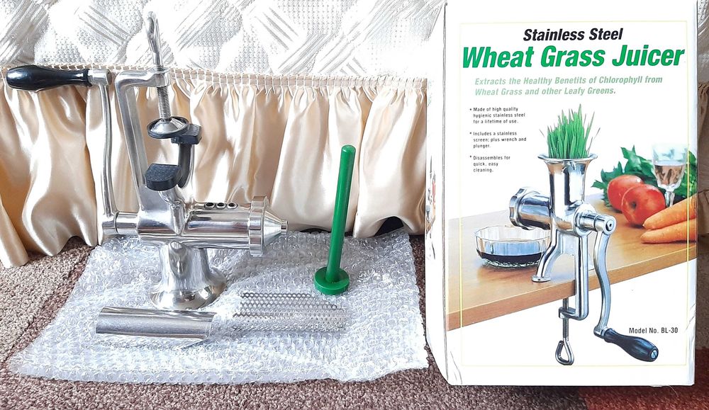 Ръчна сокоизстисквачка от неръждаема стомана.