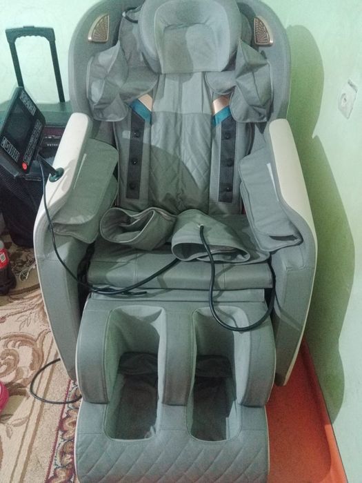 Массажный кресло