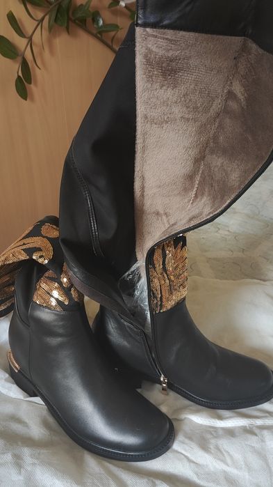 Продам новые сапоги