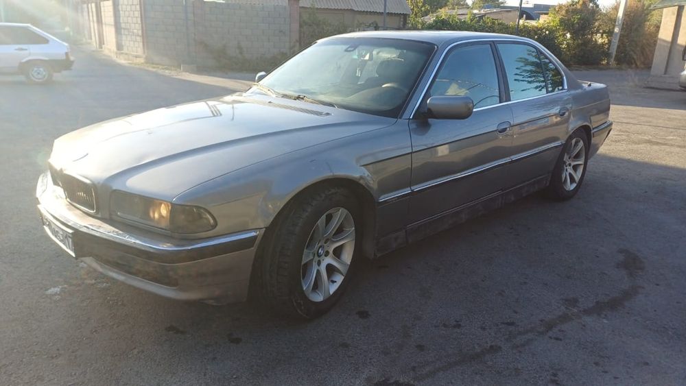 Бмв семёрка автомат