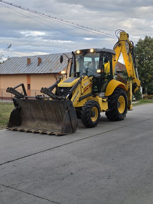 Buldo-excavator New Holland B100B doar 1598 ore!!!