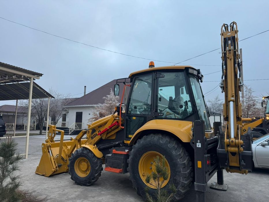 Эксковатор погрузчик 3в1