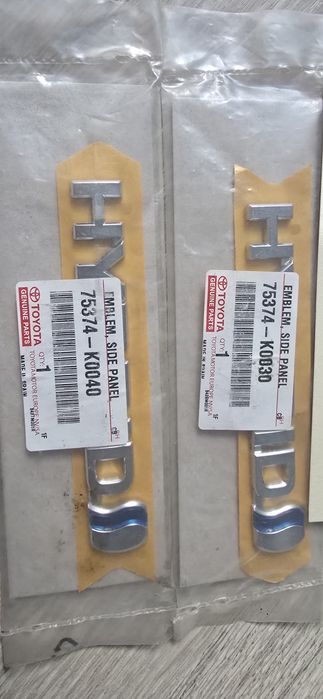 Embleme / Logouri Originale Toyota Hybrid Noi OEM (Haion și Aripi/Laterale)