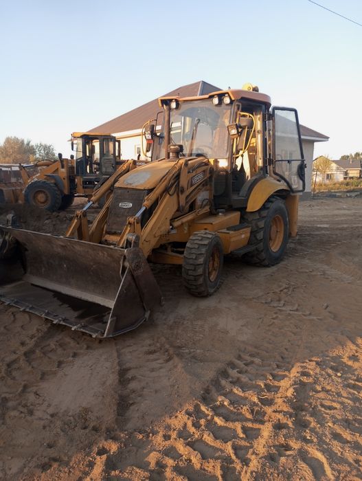 Продам экскаватор погрузчик