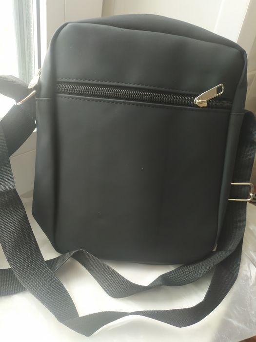 Продам Барсетку ,черная.